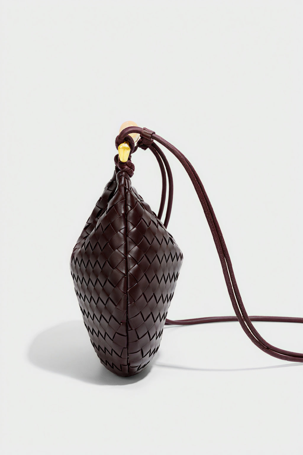 Elegante Halbmond-Tasche mit Webmuster