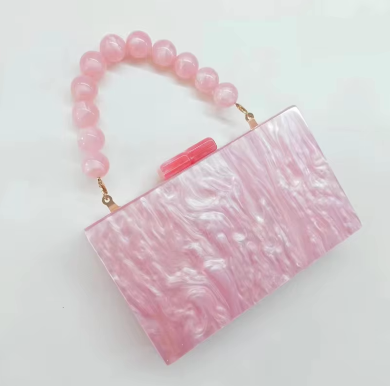 Elegante Clutch mit Perlen-Henkel